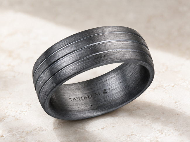 tantalum men's wedding band with three grooves