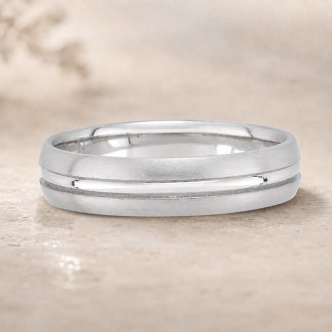 classic retro looking men's wedding band with center groove