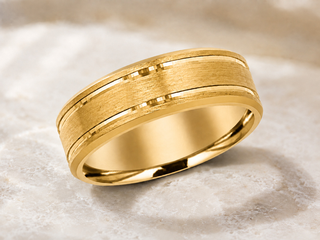 designed men's wedding band. in yellow gold